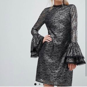 Little Mistress Metallic Cutwork Lace Swing
Dress With Fluted Sleeve Detail